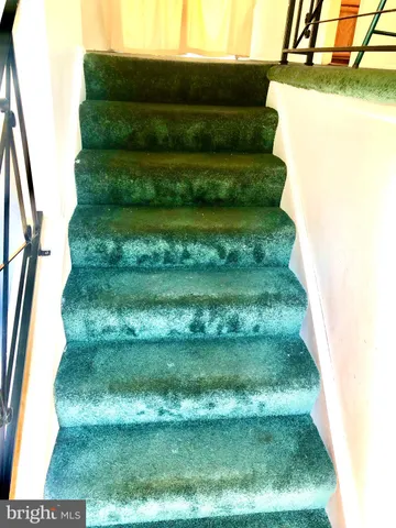 a view of swimming pool with a yard