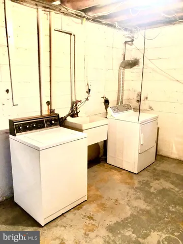 a kitchen with a sink and a stove