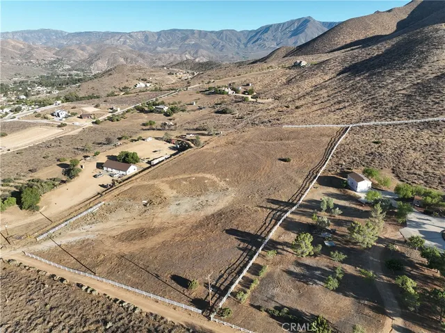 a view of an ocean with a mountain