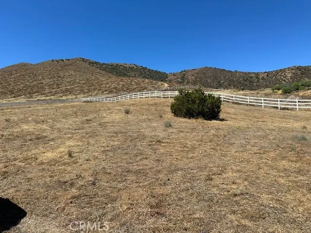 a view of ocean with mountain