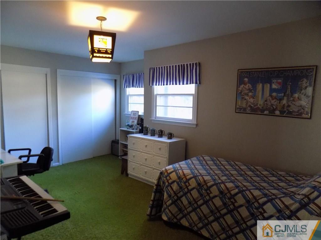 28 Taylor Road Princeton, NJ 08540 - Photo 14 of 24 a bedroom with bed and a window