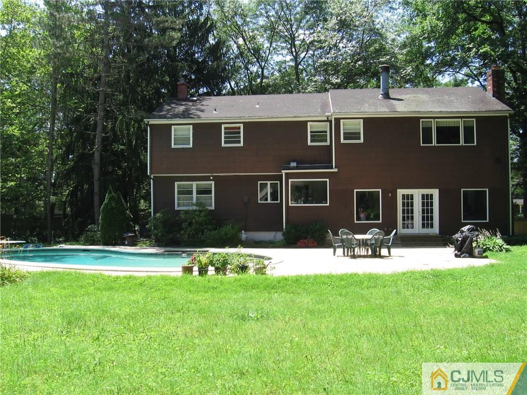 28 Taylor Road Princeton, NJ 08540 - Photo 15 of 24 a front view of a house with a yard and trees