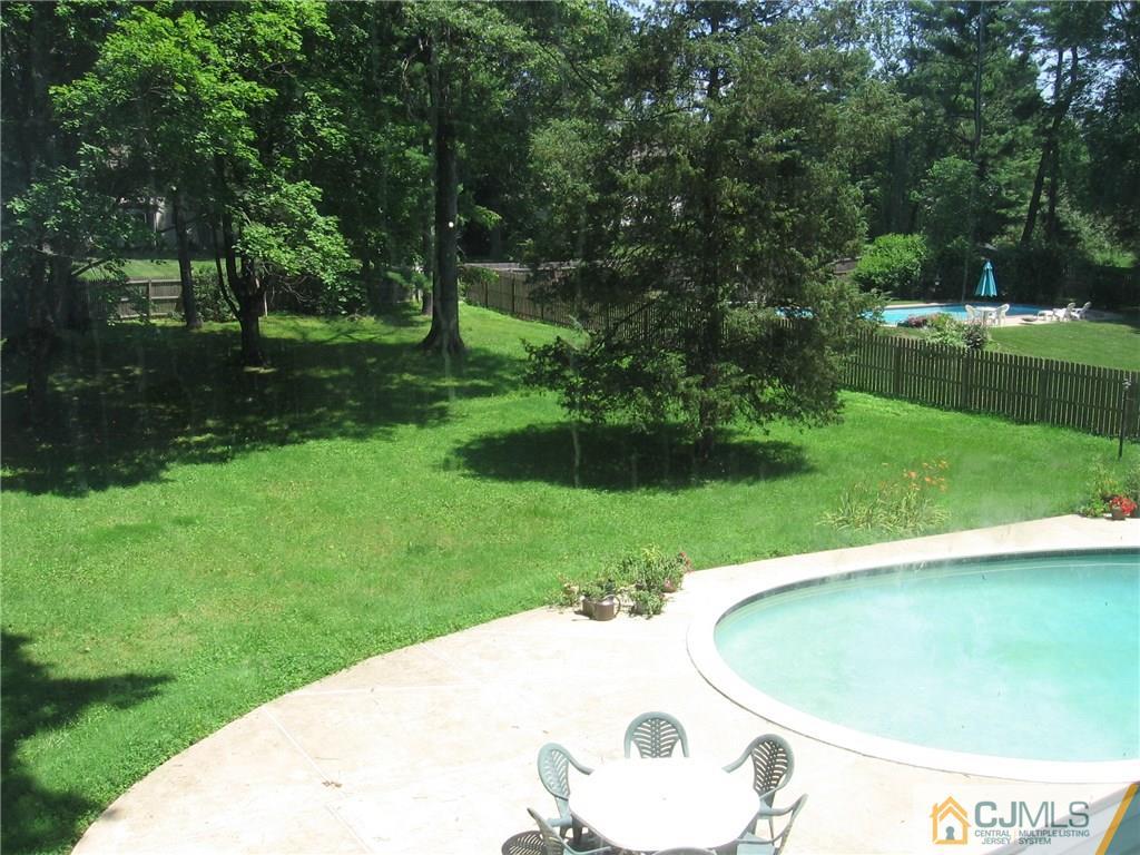 28 Taylor Road Princeton, NJ 08540 - Photo 16 of 24 a view of a swimming pool and a yard