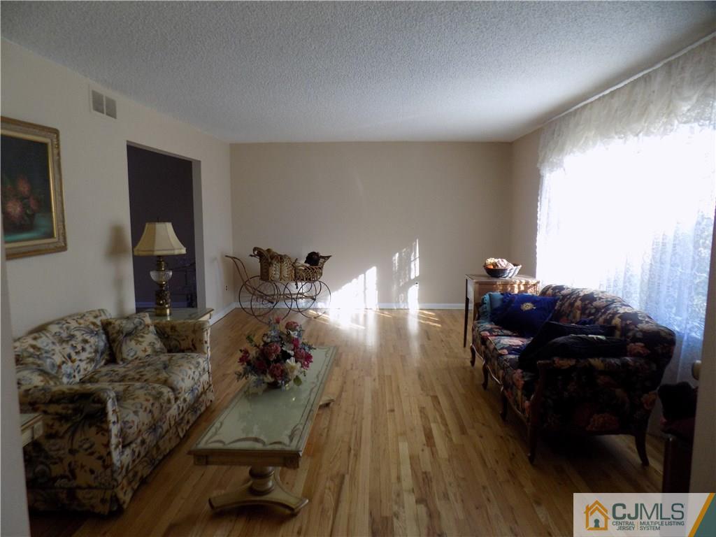 28 Taylor Road Princeton, NJ 08540 - Photo 20 of 24 a living room with furniture and wooden floor