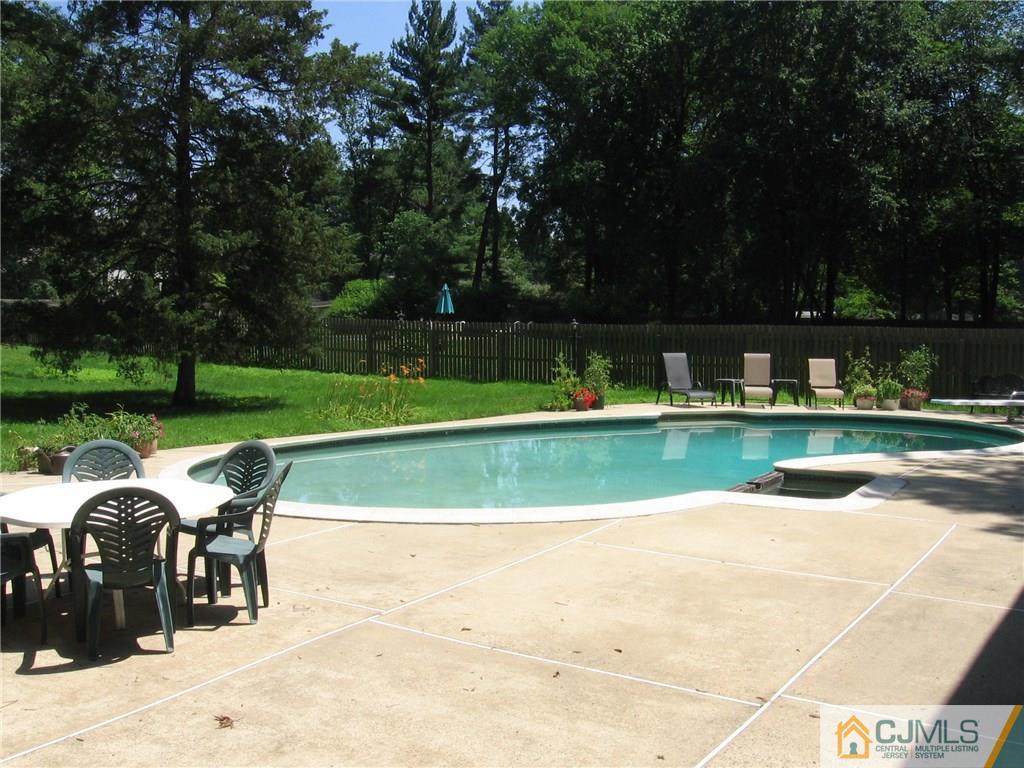 28 Taylor Road Princeton, NJ 08540 - Photo 5 of 24 a view of a swimming pool and a yard