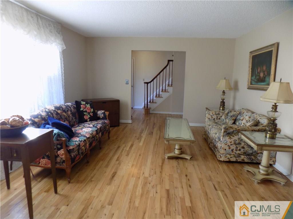 28 Taylor Road Princeton, NJ 08540 - Photo 9 of 24 a living room with furniture and a wooden floor