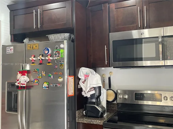 a front view of a house with entryway and chandelier