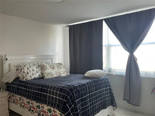 a bathroom with a shower and toilet