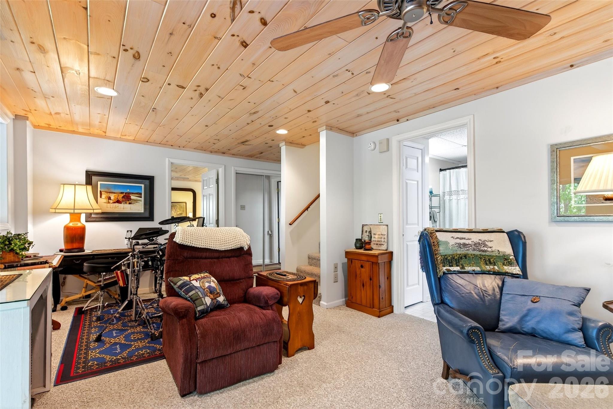 334 Harbor Lake Road Newland, NC 28657 - Photo 27 of 48 a living room with furniture and a wooden floor