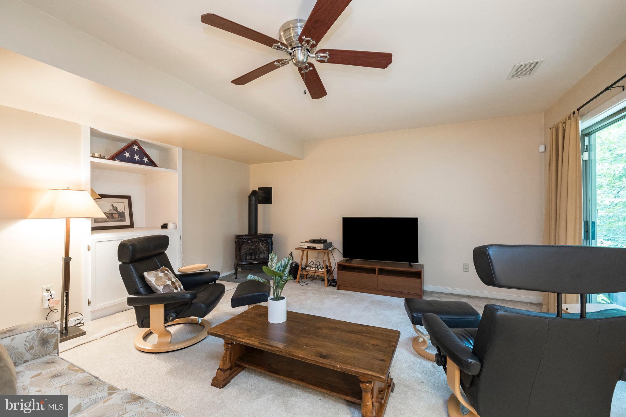 537 Fillman Road Downingtown, PA 19335 - Photo 31 of 57 lower level family room w/ propane stove