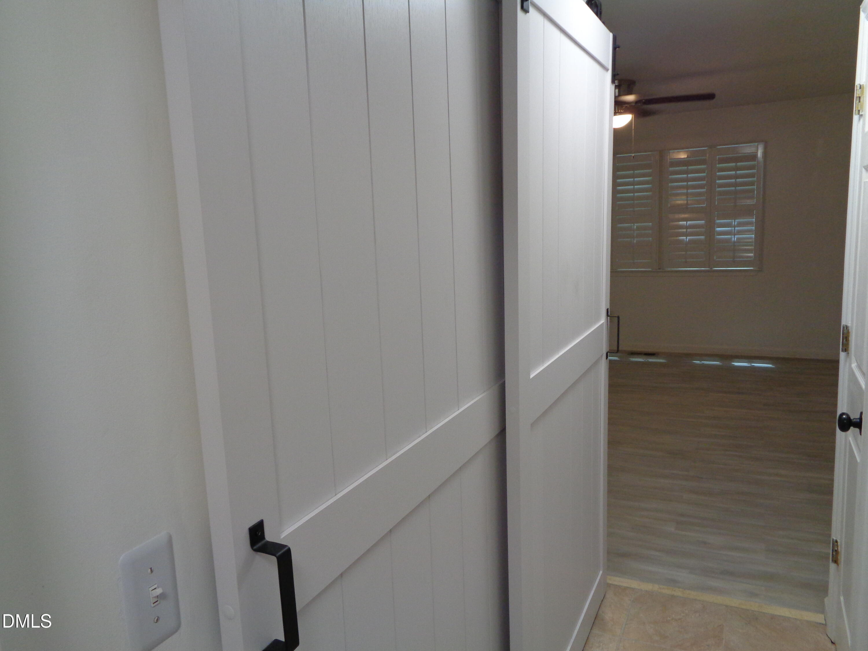 8331 Hempshire Place, Unit 102 Raleigh, NC 27613 - Photo 16 of 26 Master bedroom closet doors