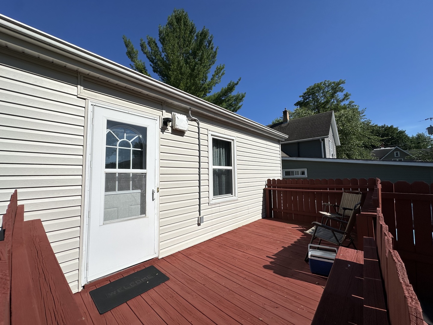 623 4th Avenue Dixon, IL 61021 - Photo 18 of 19 a balcony with wooden floor table and chairs