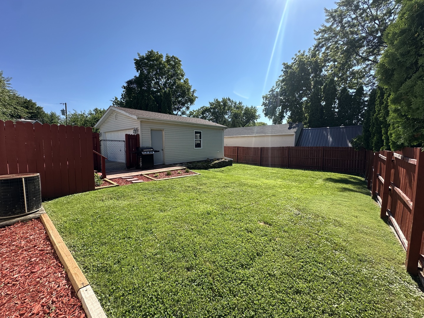 623 4th Avenue Dixon, IL 61021 - Photo 19 of 19 a view of a backyard with a garden