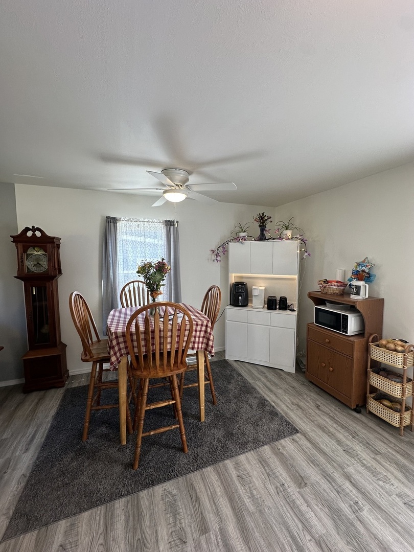 623 4th Avenue Dixon, IL 61021 - Photo 4 of 19 a view of a dining room with furniture and wooden floor