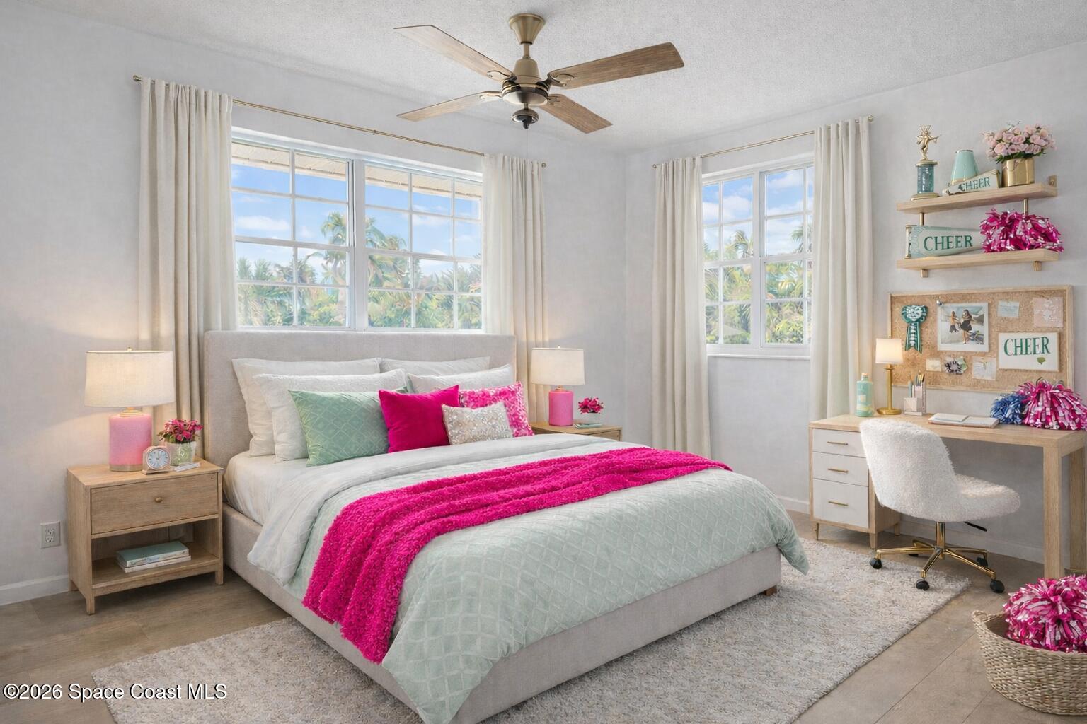 850 Cardinal Road Cocoa, FL 32926 - Photo 13 of 41 a bedroom with a bed a chandelier and a window