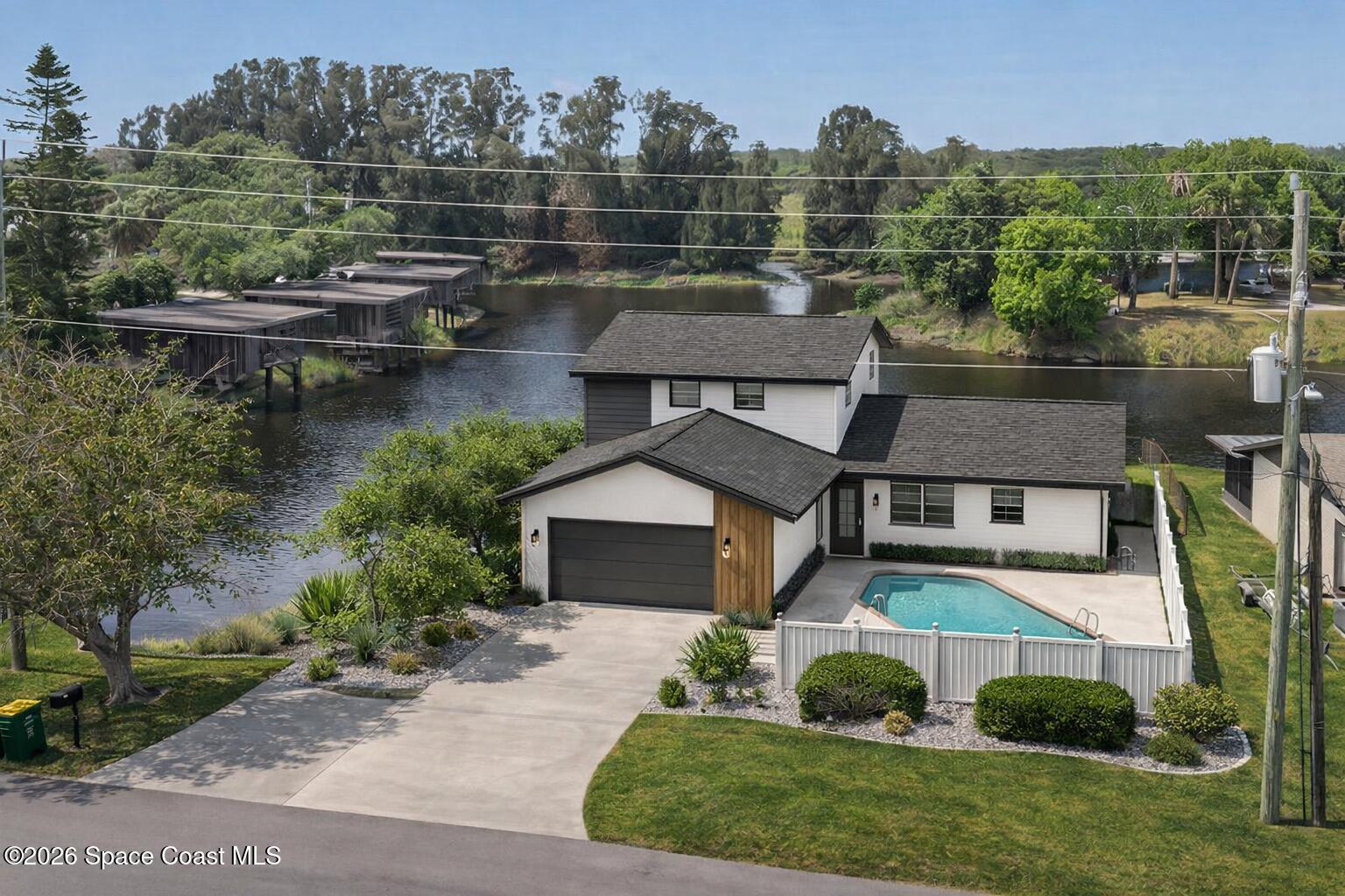 850 Cardinal Road Cocoa, FL 32926 - Photo 23 of 41 an aerial view of a house with garden