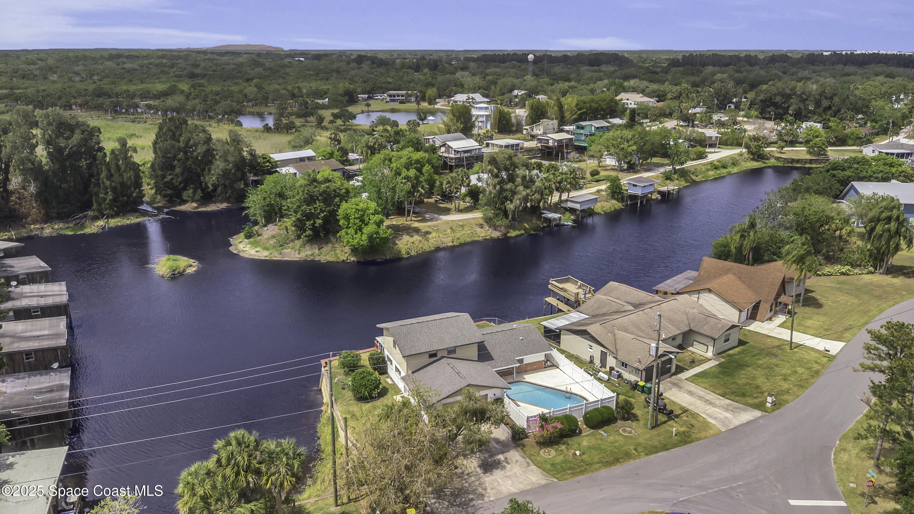 850 Cardinal Road Cocoa, FL 32926 - Photo 38 of 41 a view of a lake with houses