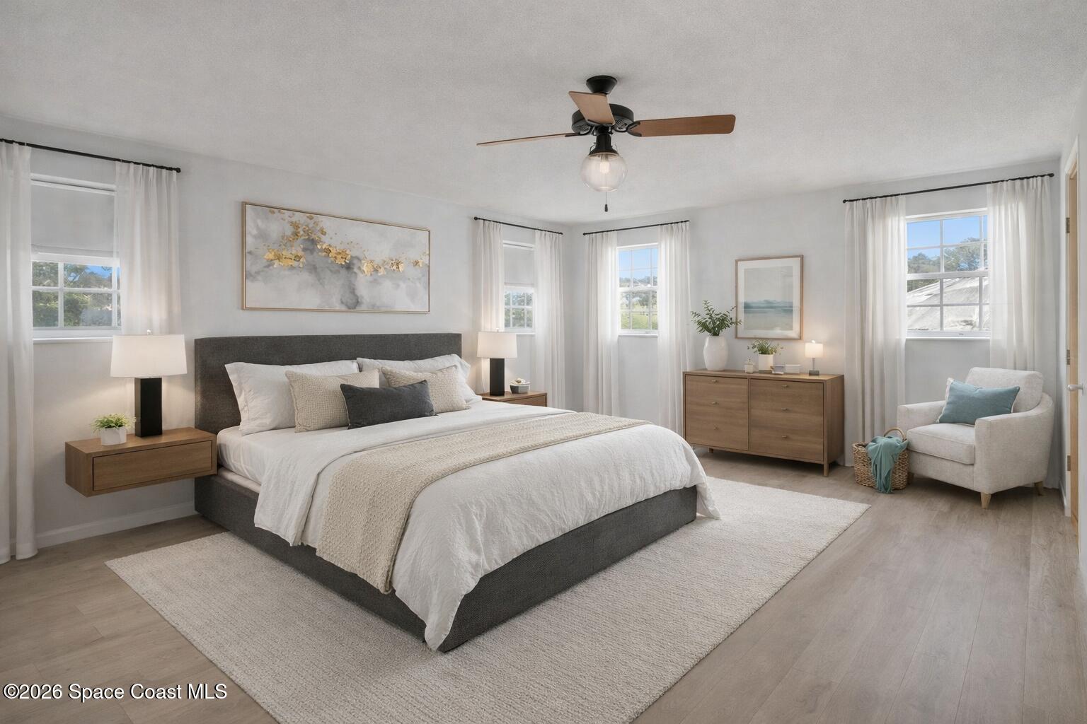 850 Cardinal Road Cocoa, FL 32926 - Photo 7 of 41 a spacious bedroom with a bed and furniture