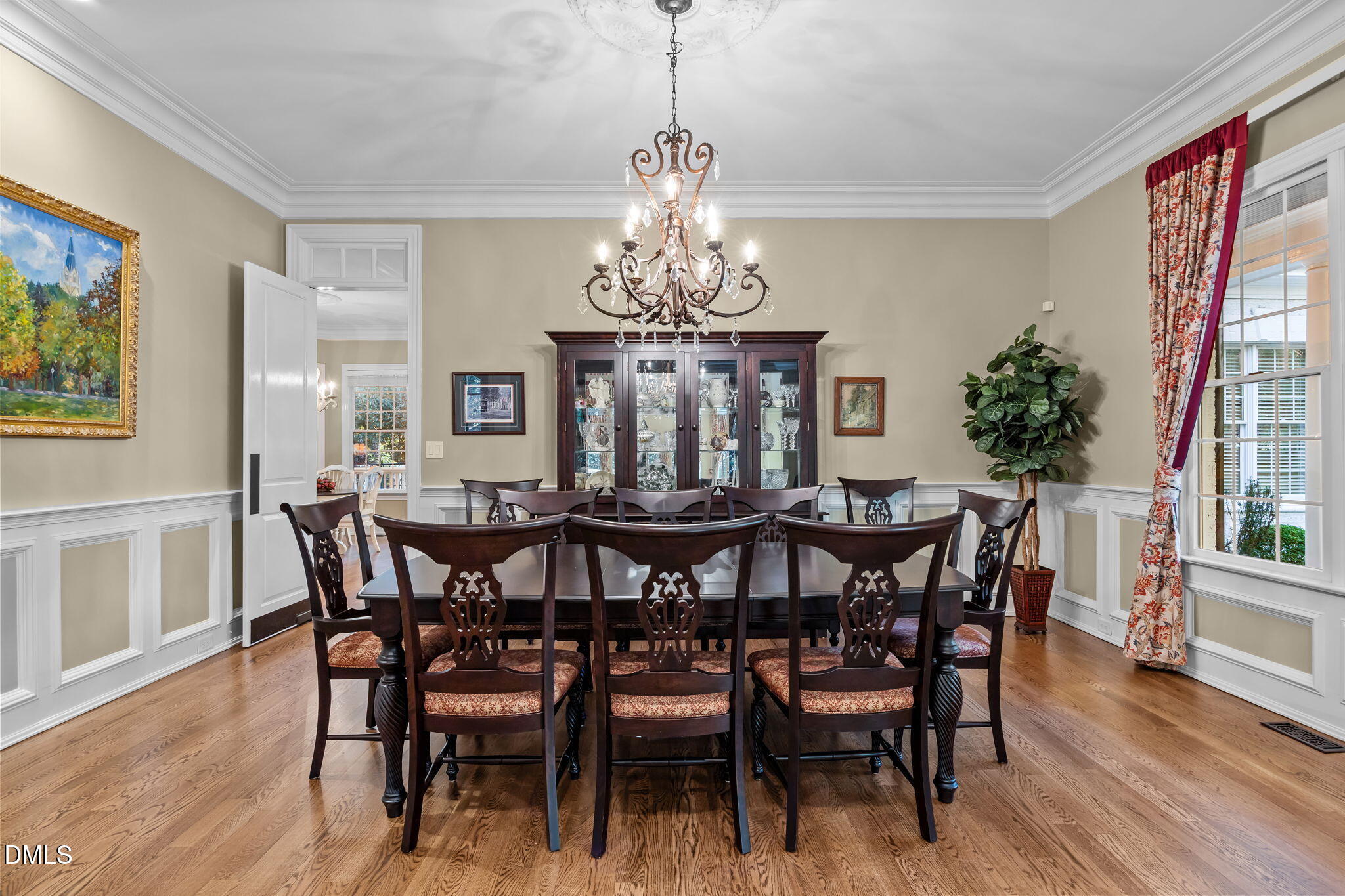 116 Carramore Lane Durham, NC 27705 - Photo 10 of 56 a view of a dining room with furniture window and wooden floor