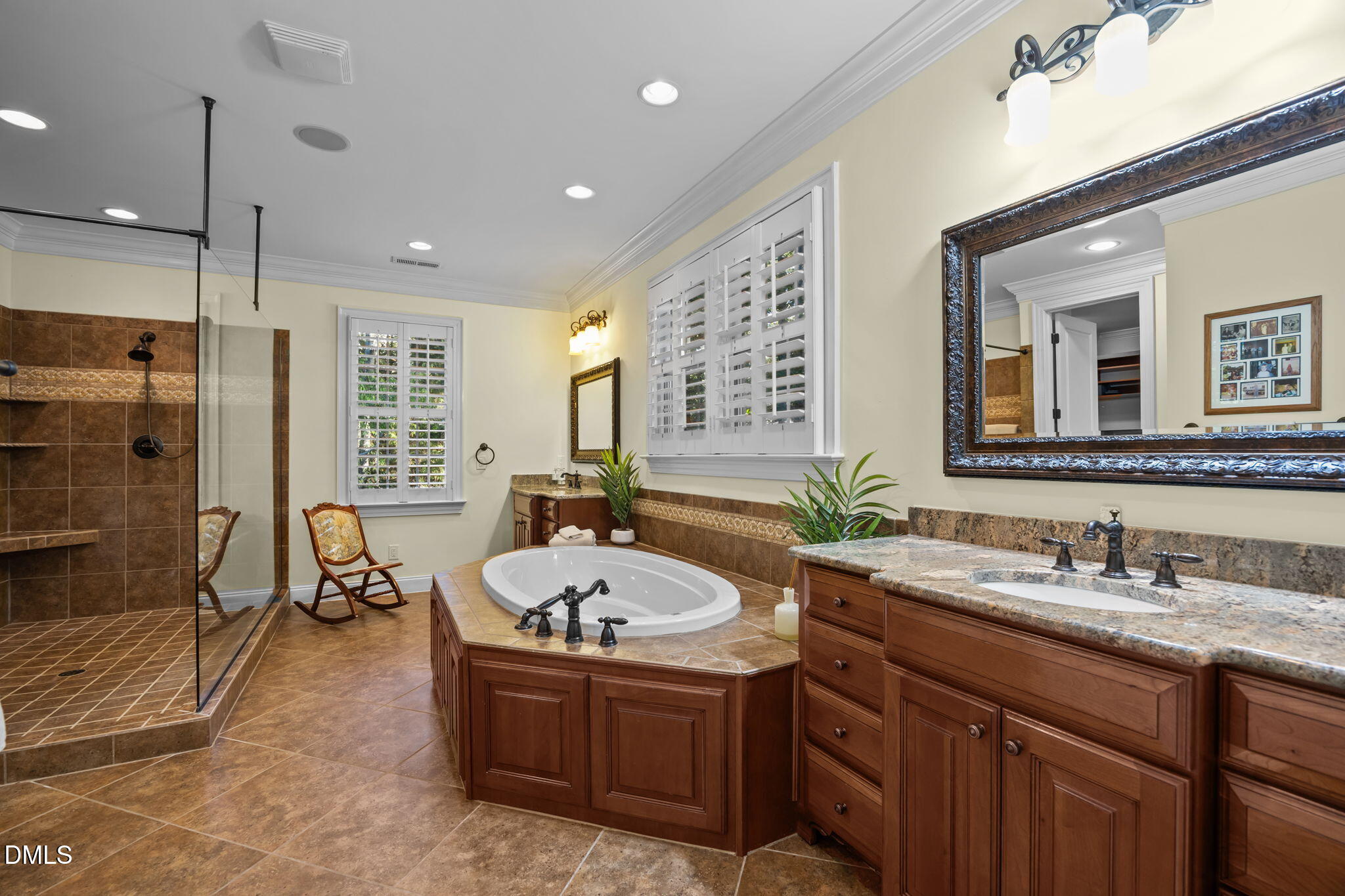 116 Carramore Lane Durham, NC 27705 - Photo 32 of 56 a spacious bathroom with a sink double vanity and a shower