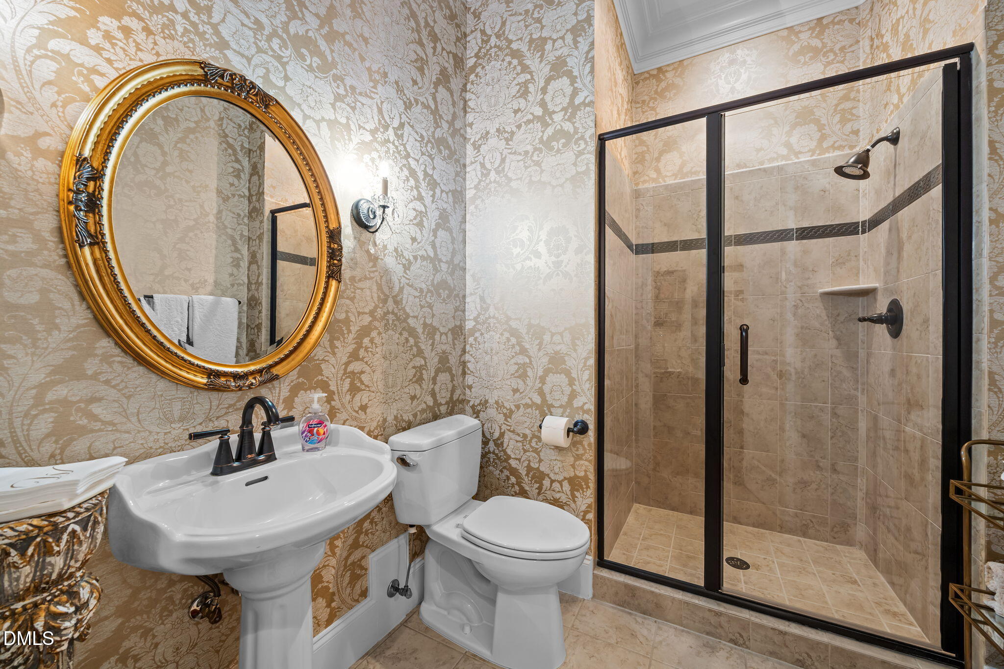 116 Carramore Lane Durham, NC 27705 - Photo 35 of 56 a bathroom with a sink a toilet and a mirror