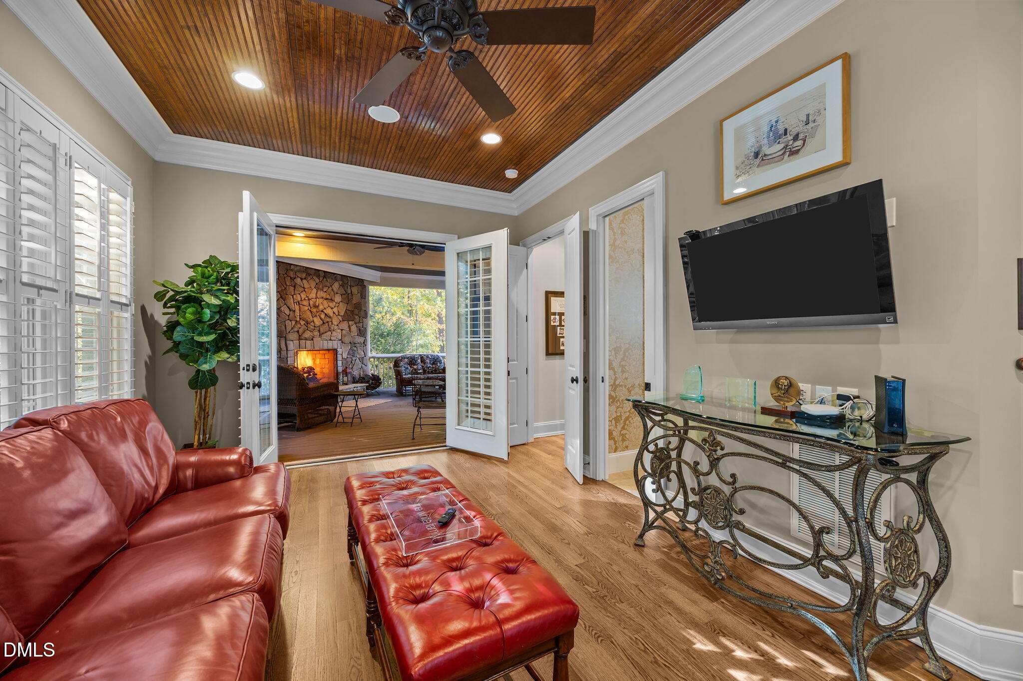 116 Carramore Lane Durham, NC 27705 - Photo 36 of 56 a living room with furniture and a flat screen tv