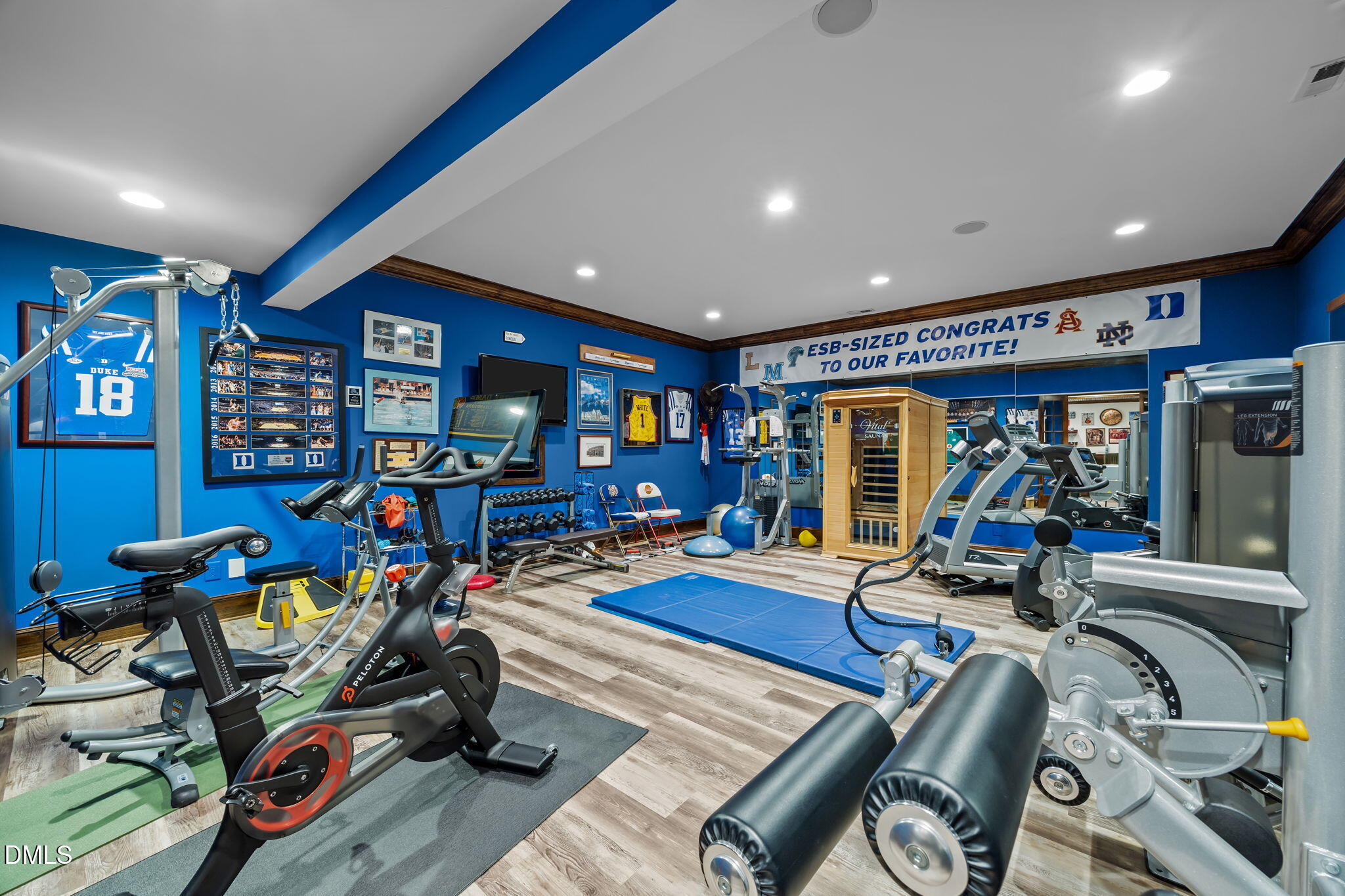 116 Carramore Lane Durham, NC 27705 - Photo 47 of 56 a living room with lots of furniture and a flat screen tv