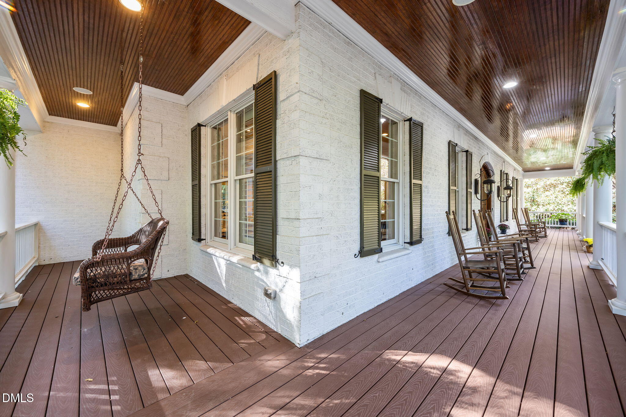 116 Carramore Lane Durham, NC 27705 - Photo 54 of 56 a view of a house with chairs on wooden floor