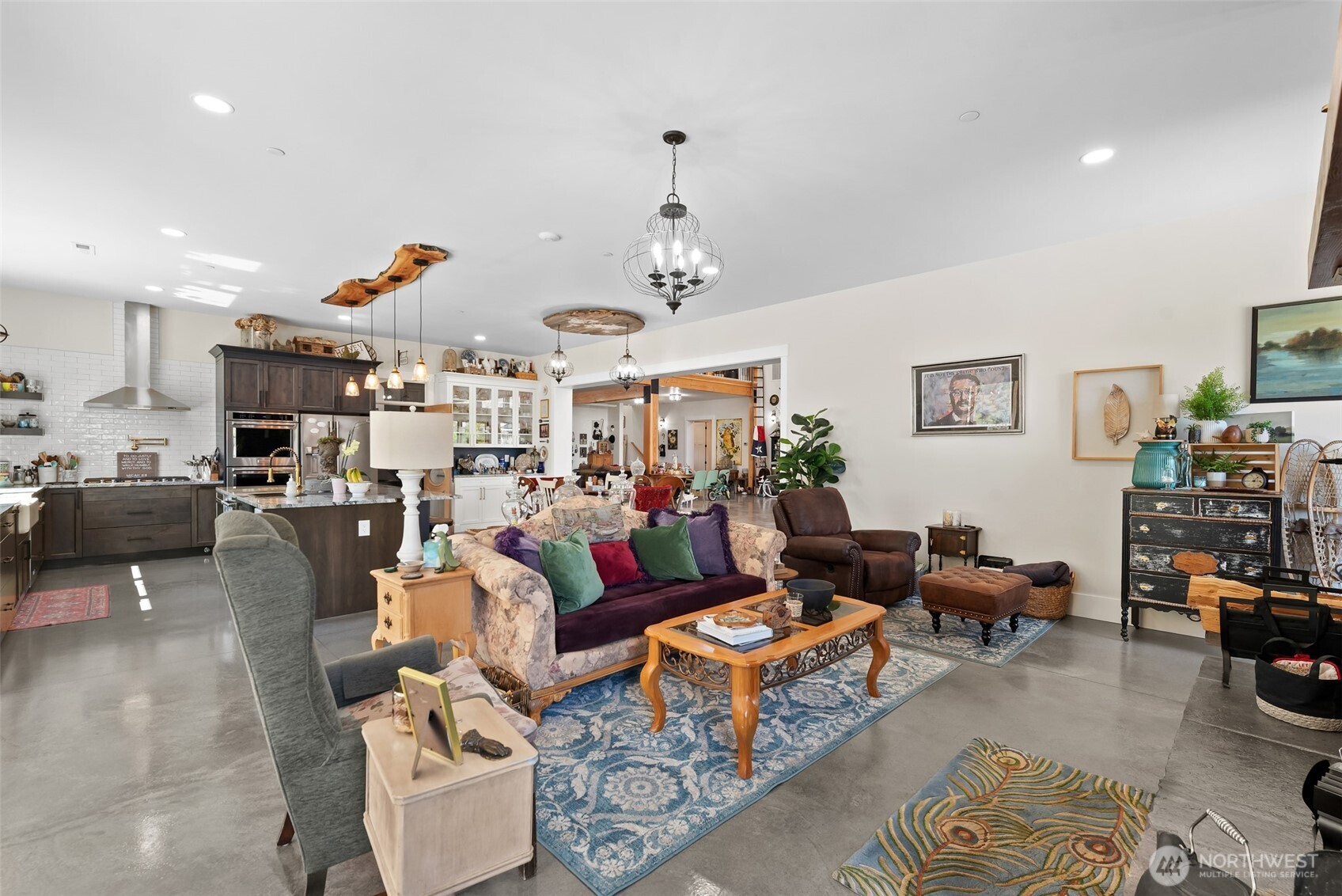 1541 Pitcher Canyon Road Wenatchee, WA 98801 - Photo 13 of 40 a living room with furniture kitchen view and a chandelier