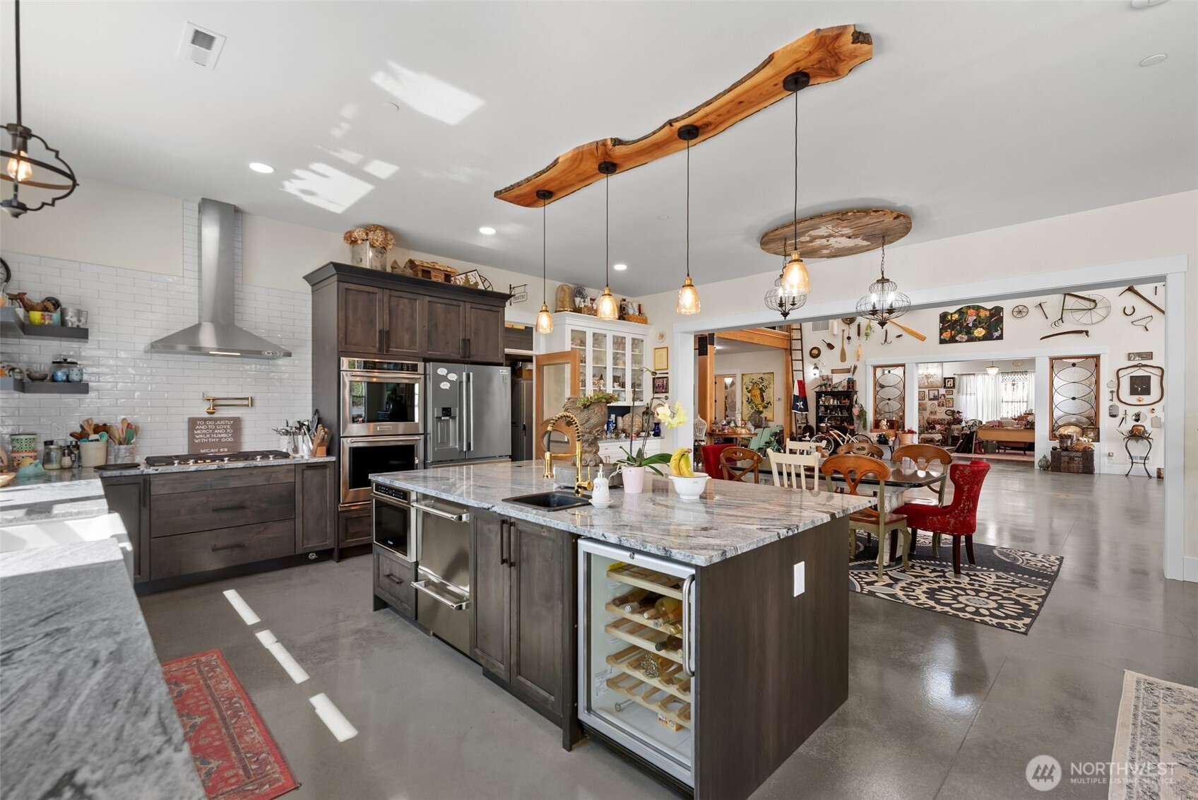1541 Pitcher Canyon Road Wenatchee, WA 98801 - Photo 15 of 40 a kitchen with stainless steel appliances granite countertop a sink a stove and a wooden floor
