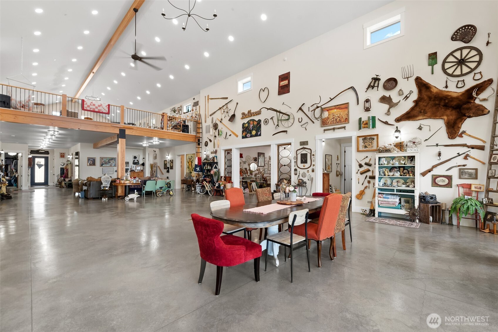 1541 Pitcher Canyon Road Wenatchee, WA 98801 - Photo 22 of 40 a dining room with lots of furniture and a chandelier