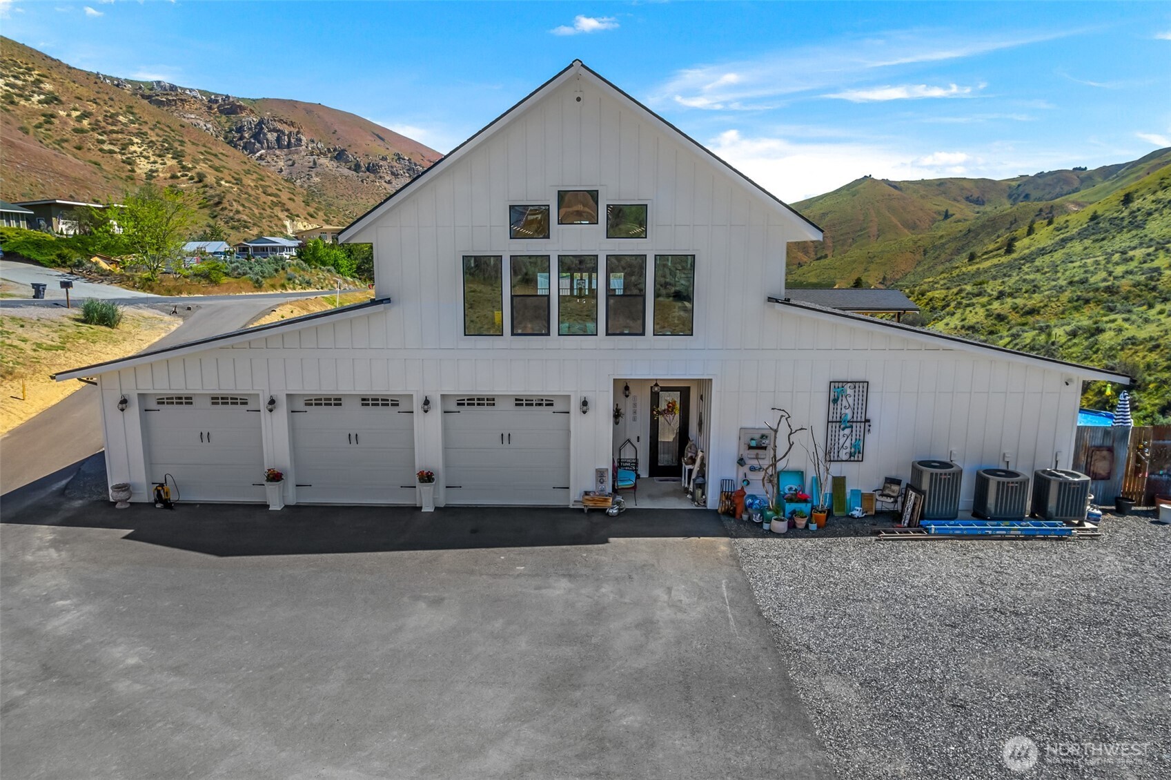 1541 Pitcher Canyon Road Wenatchee, WA 98801 - Photo 3 of 40 a front view of a house with a yard