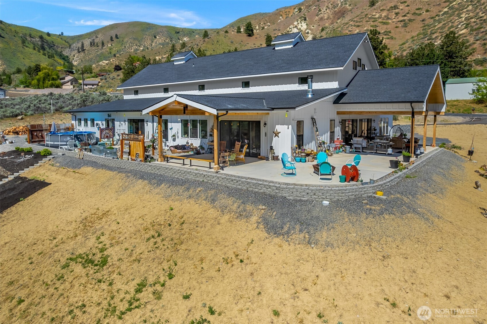 1541 Pitcher Canyon Road Wenatchee, WA 98801 - Photo 5 of 40 a view of house with outdoor space and sitting area