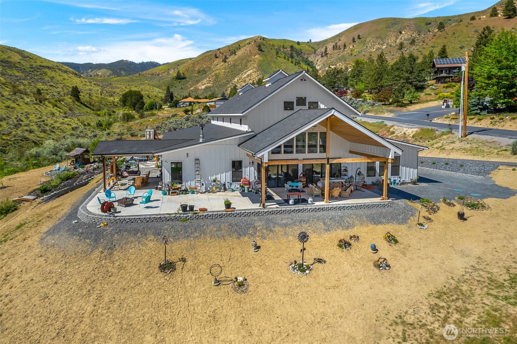 1541 Pitcher Canyon Road Wenatchee, WA 98801 - Photo 6 of 40 a swimming pool with outdoor seating