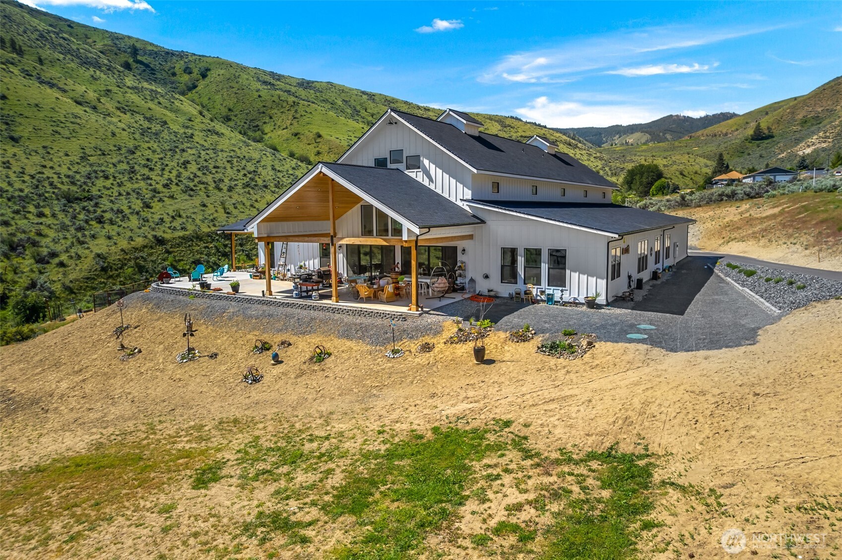 1541 Pitcher Canyon Road Wenatchee, WA 98801 - Photo 7 of 40 a view of a house with pool and a yard