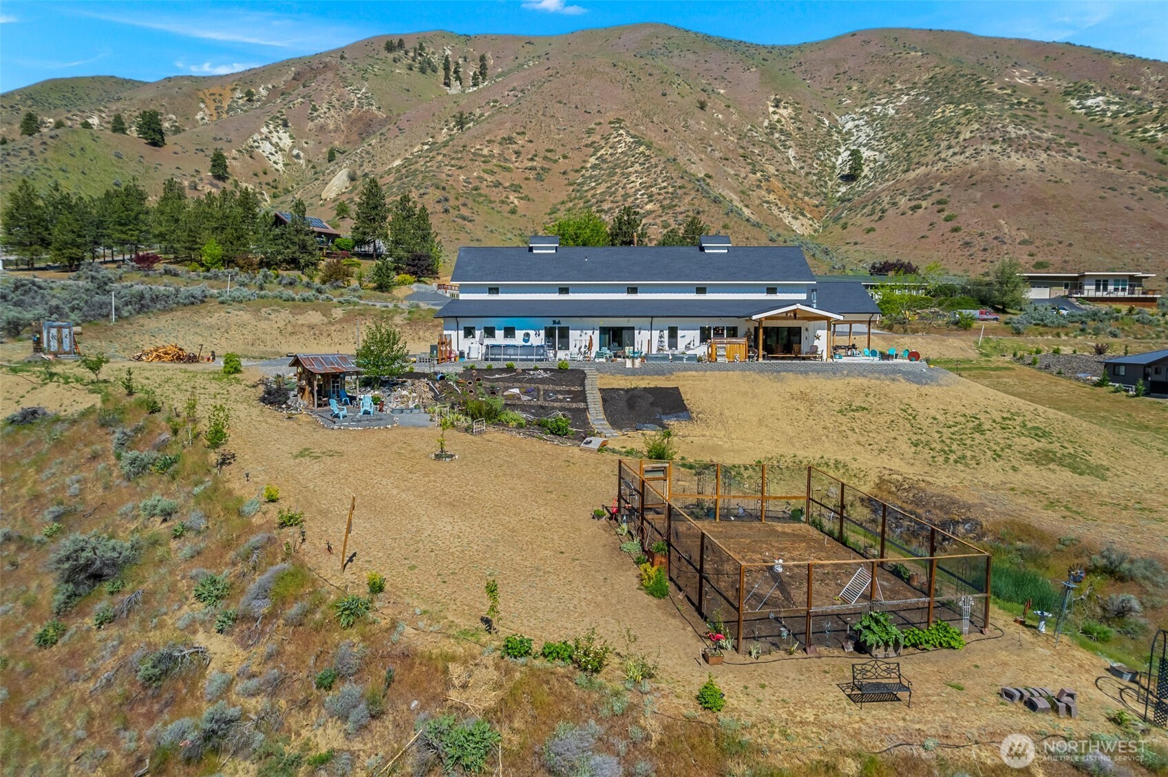 1541 Pitcher Canyon Road Wenatchee, WA 98801 - Photo 8 of 40 an aerial view of residential houses with outdoor space