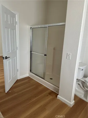 a bathroom with a bathtub and a window