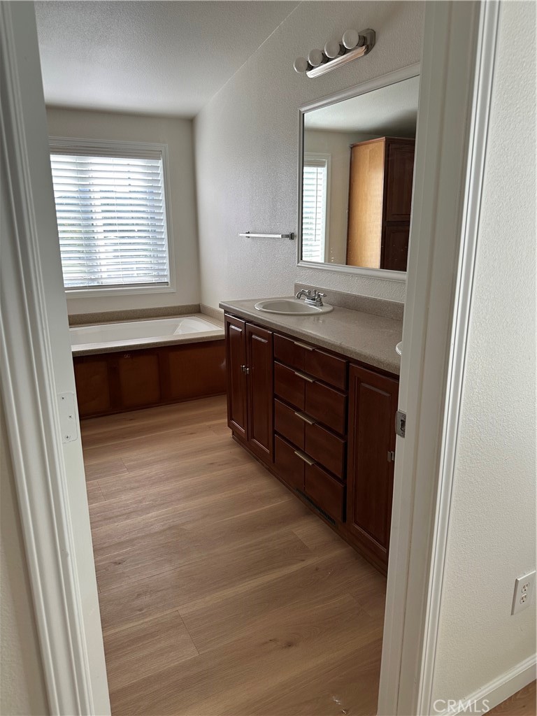 21204 Versaie Perris, CA 92570 - Photo 22 of 33 a bathroom with a sink and a mirror