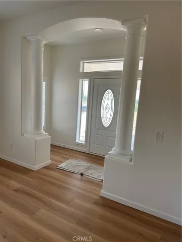a view of an empty room and window