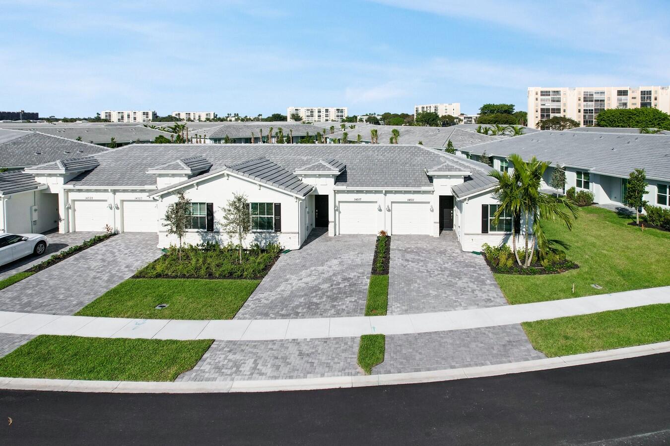 an aerial view of a house with a garden