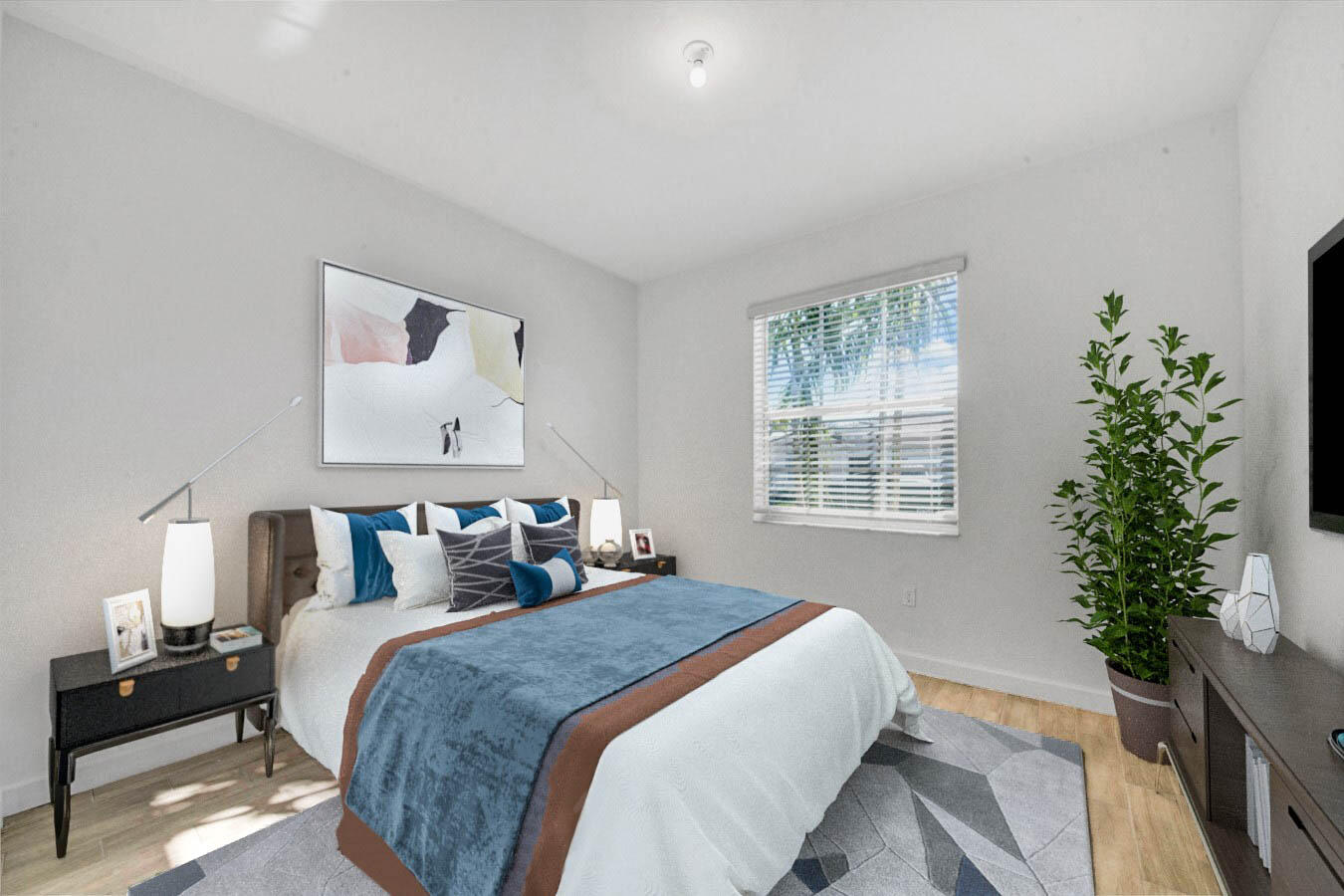 14511 Three Ponds Trail Delray Beach, FL 33446 - Photo 11 of 33 a bedroom with bed and a potted plant