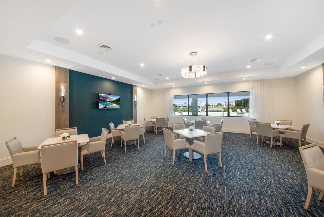 14511 Three Ponds Trail Delray Beach, FL 33446 - Photo 24 of 33 a view of a dining room with furniture