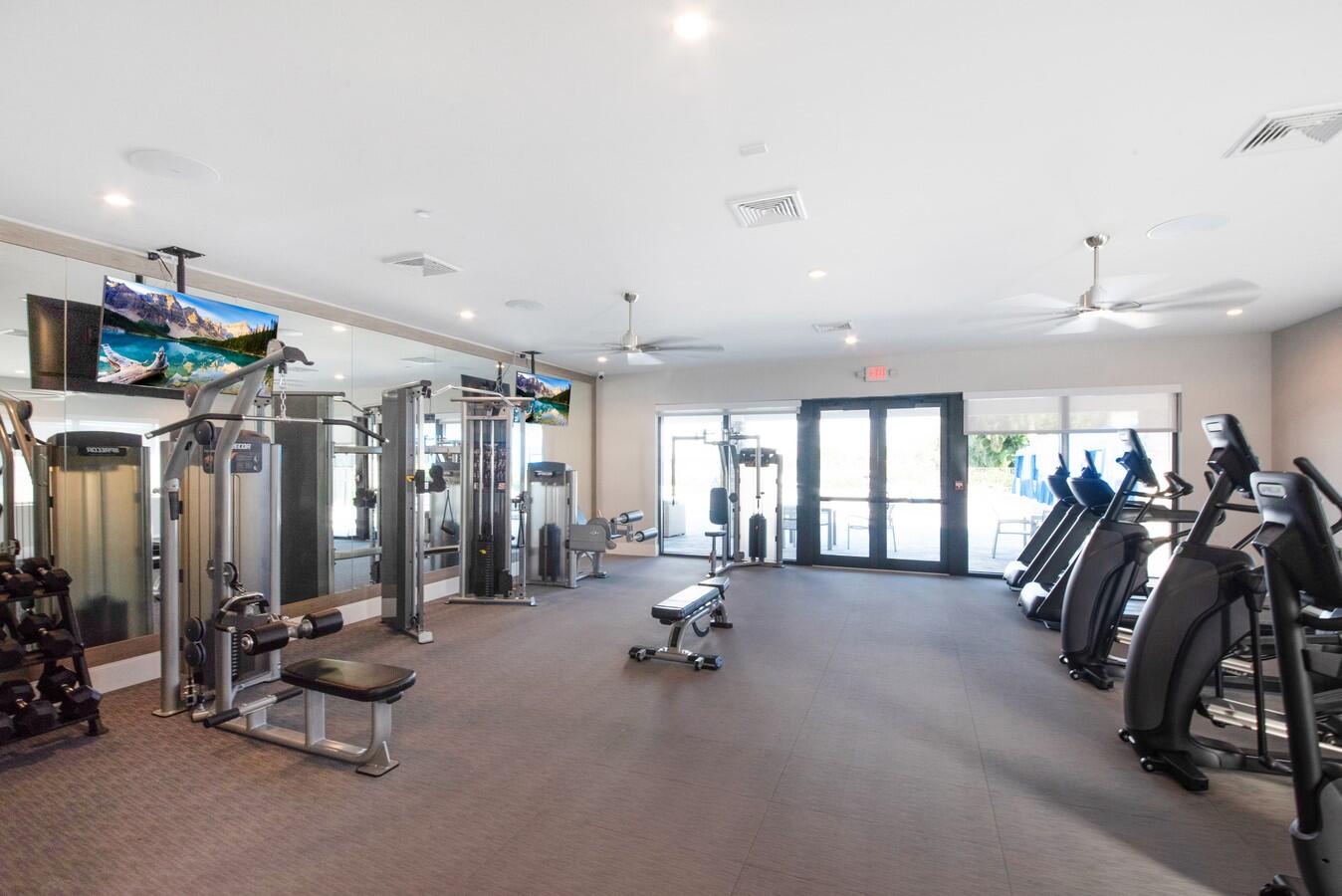14511 Three Ponds Trail Delray Beach, FL 33446 - Photo 26 of 33 a view of a room with gym equipment