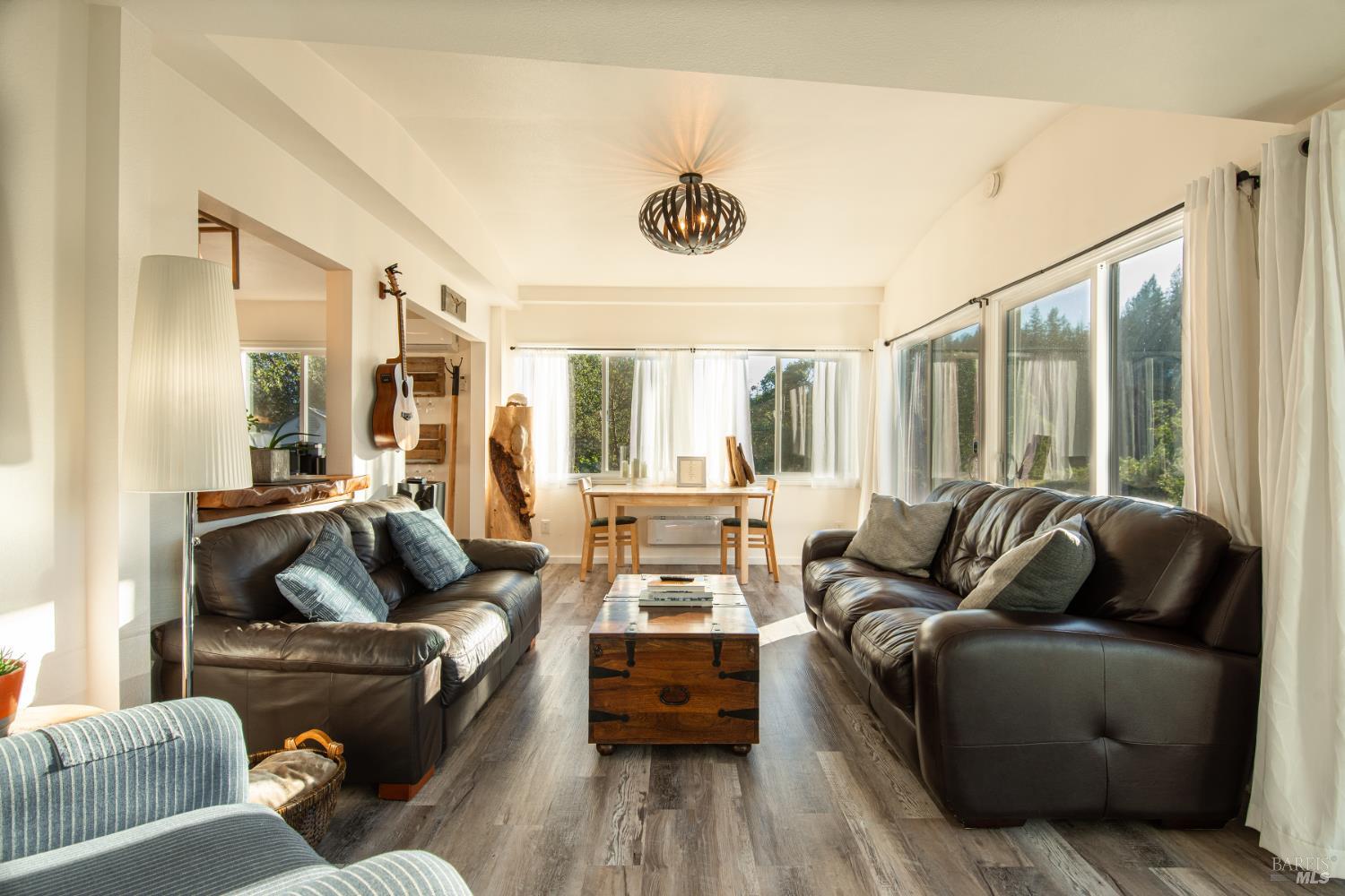 22855 Chianti Road Cloverdale, CA 95425 - Photo 38 of 76 a living room with furniture and a large window