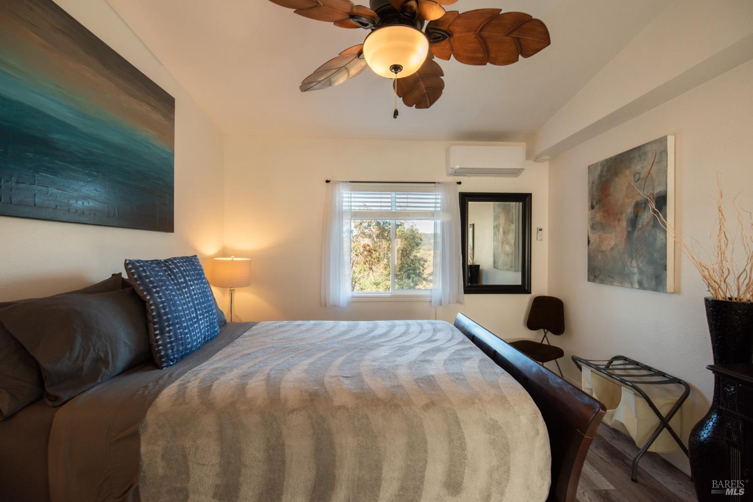 22855 Chianti Road Cloverdale, CA 95425 - Photo 39 of 76 a bedroom with a bed and window