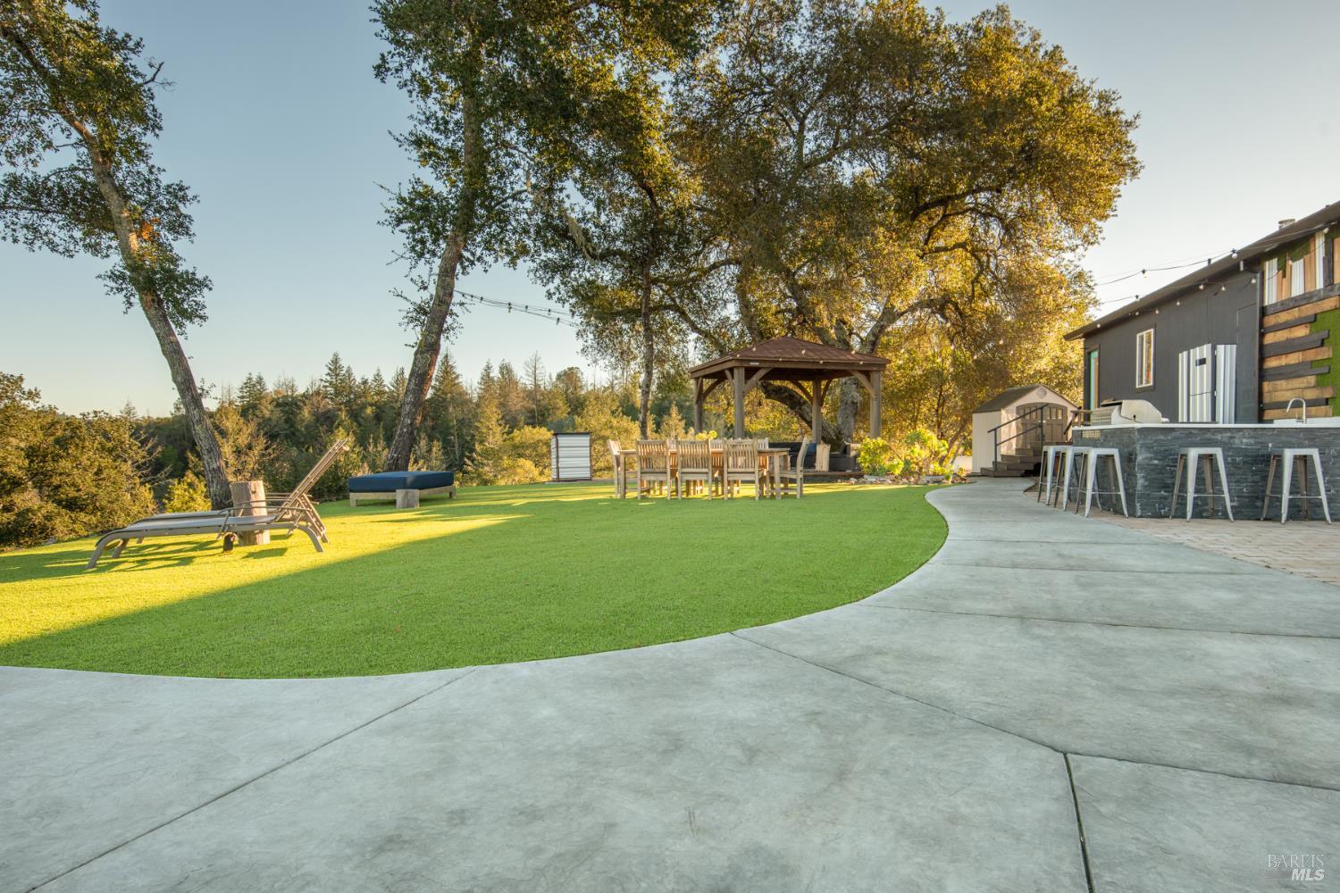 22855 Chianti Road Cloverdale, CA 95425 - Photo 57 of 76 a view of yard with swimming pool and green space