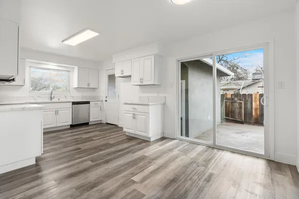 a kitchen with a sink and cabinets