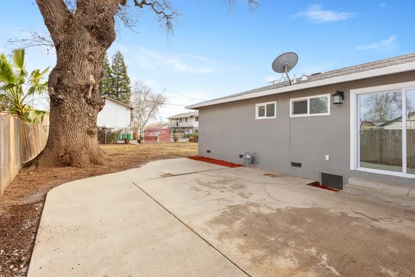 a house with trees in front of it
