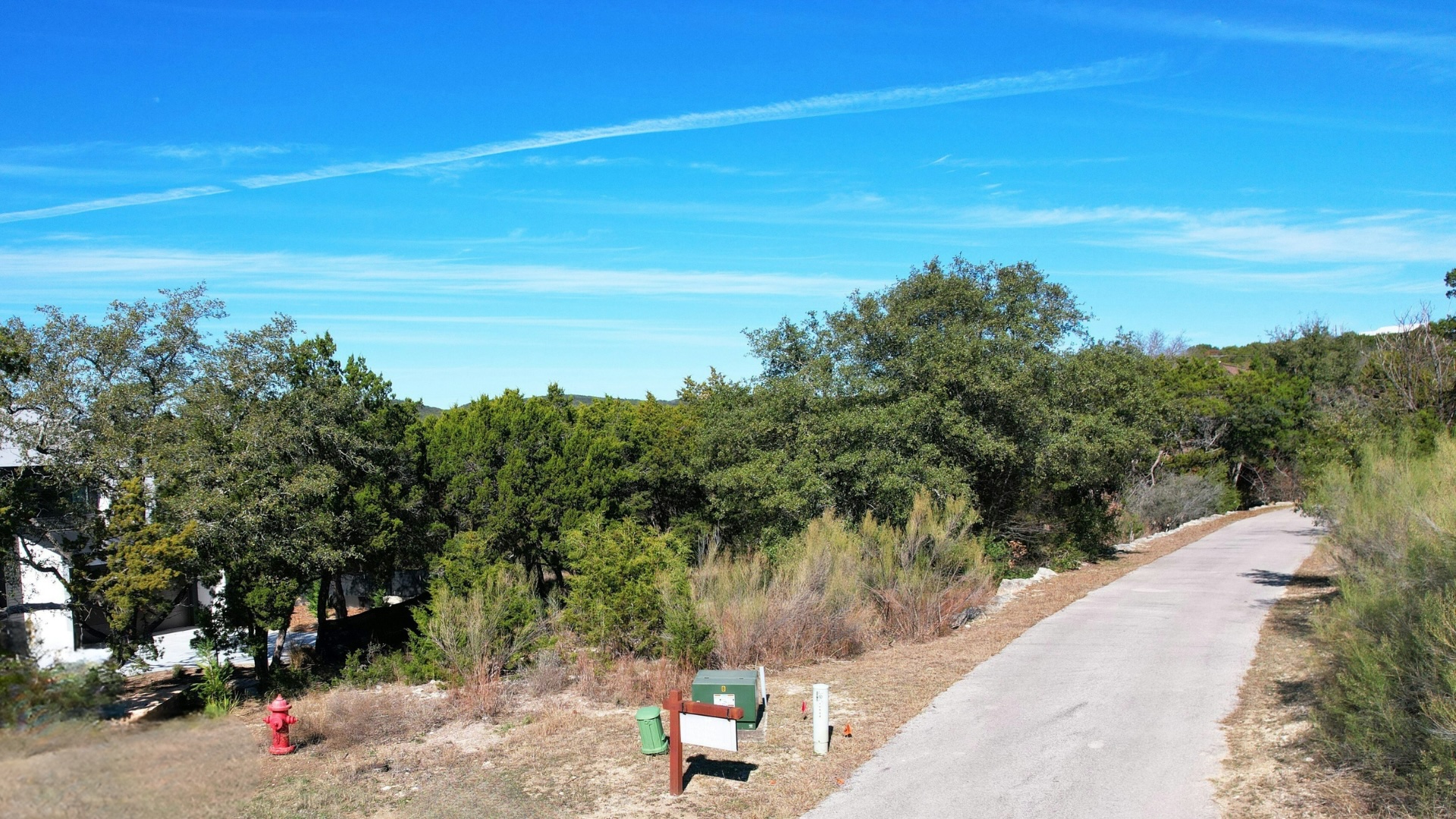 18849 Hidden Ridge Place Jonestown, TX 78645 - Photo 4 of 14 a view of a yard with mountain view