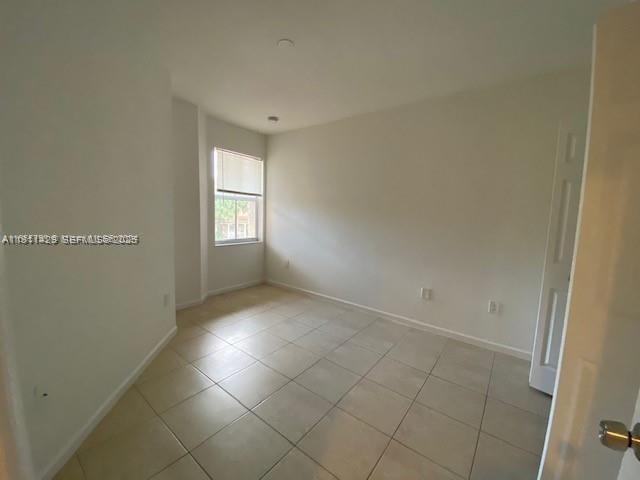 2708 Southwest 83rd Avenue, Unit 105 Miramar, FL 33025 - Photo 11 of 15 a view of empty room with window